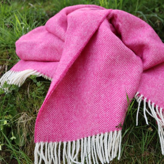 Bright Fuchsia Pink Shetland Wool Blanket beautifully draped in natural setting