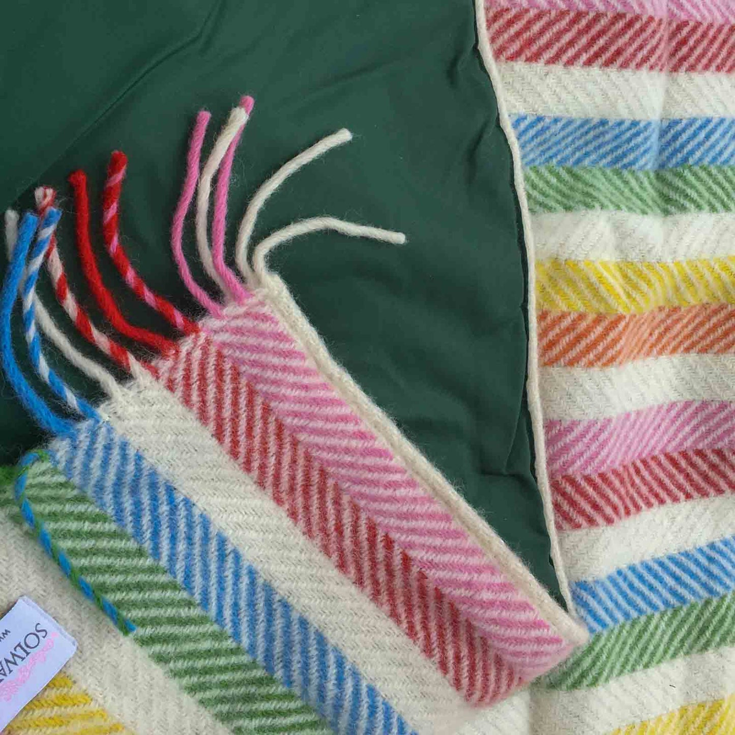 Colorful Rainbow striped pure wool luxury picnic blanket with tassels with a green waterproof backing