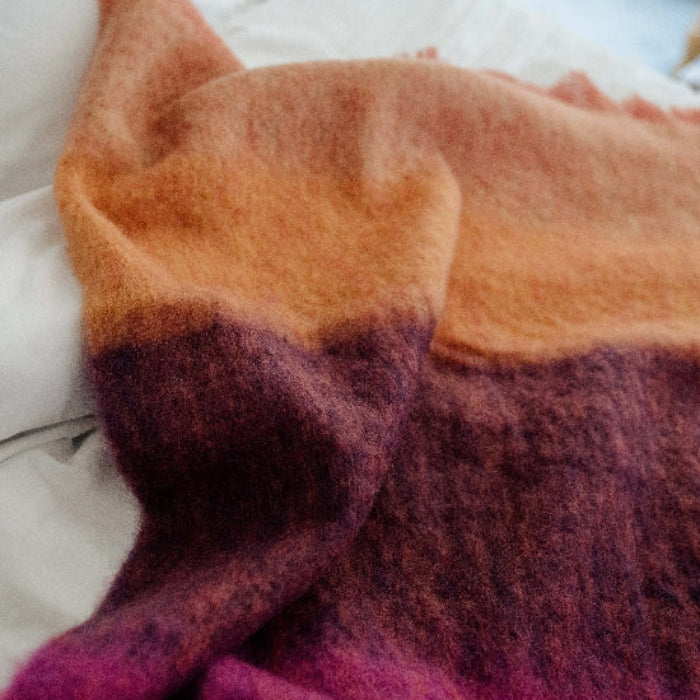 Gradient mohair blanket transitioning from orange to purple on a white background - Fuchsia Mohair Throw