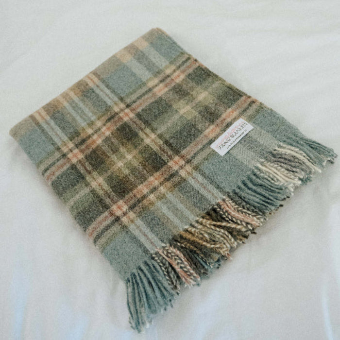 Glen Coe Shetland Pure New Wool Blanket with fringes on a white surface