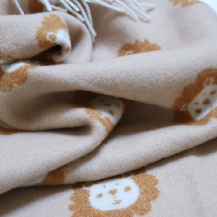 Lion Caramel Merino Wool Baby Blanket on a white background