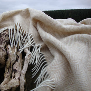Textured Natural Herringbone Shetland Wool Blanket with intricate patterns and a neutral colour palette