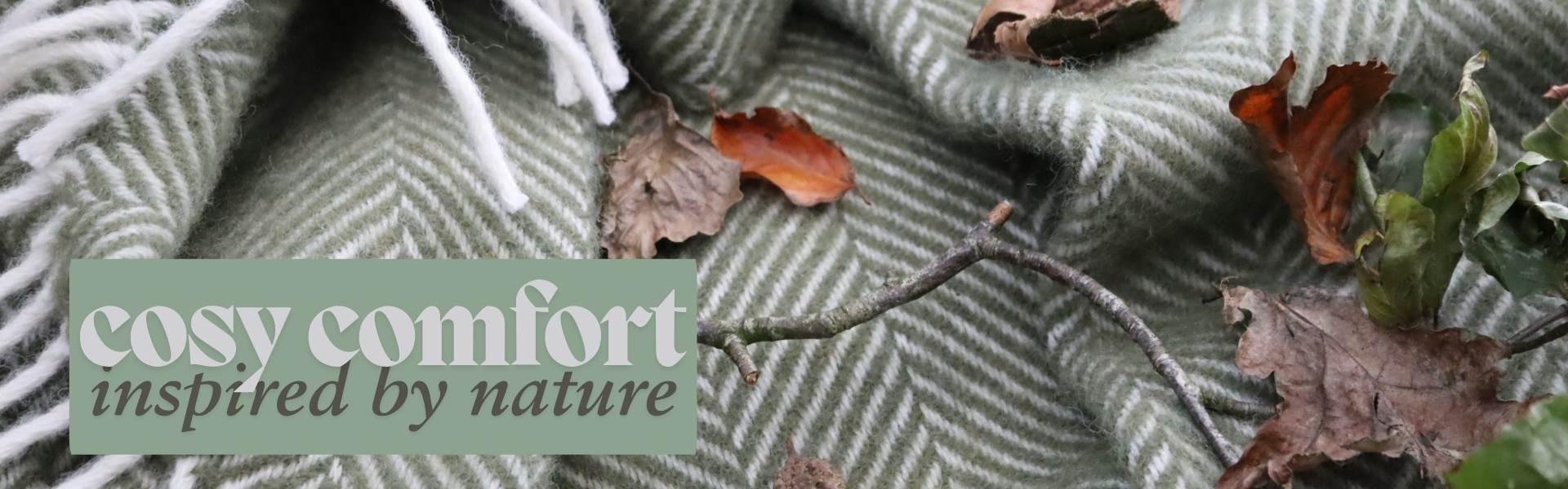 Olive green fishbone wool blanket with autumn leaves